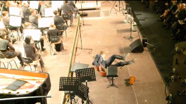 Composer Smashes Instruments in Protest